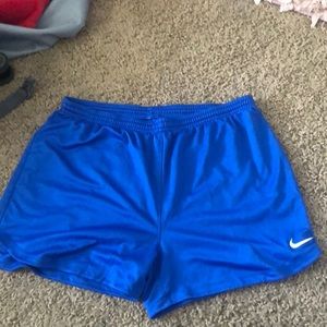 Blue Nike shorts